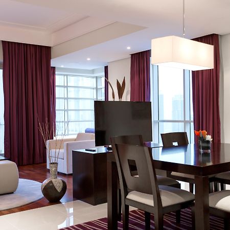 Pullman Dubai Jumeirah Lakes Towers Εξωτερικό φωτογραφία A suite at the hotel